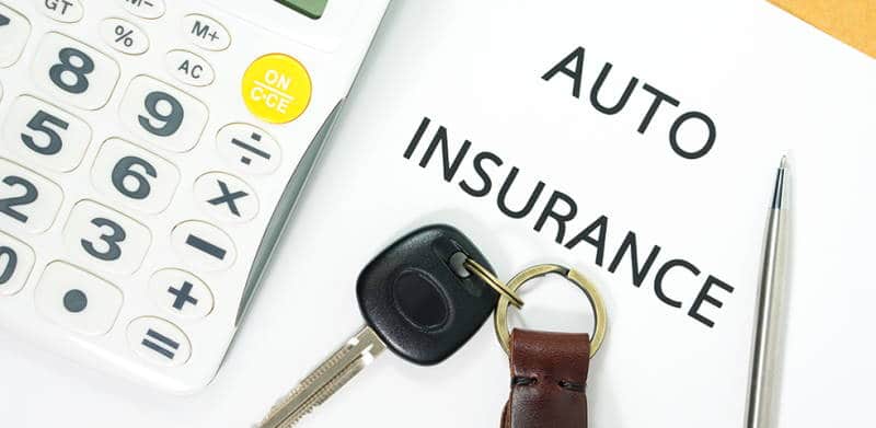 Auto Insurance With Car Key And Calculator